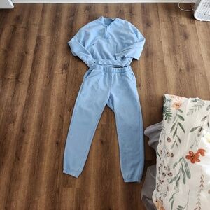 Yogalicious light blue sweat set size Large. 3/4 zip top